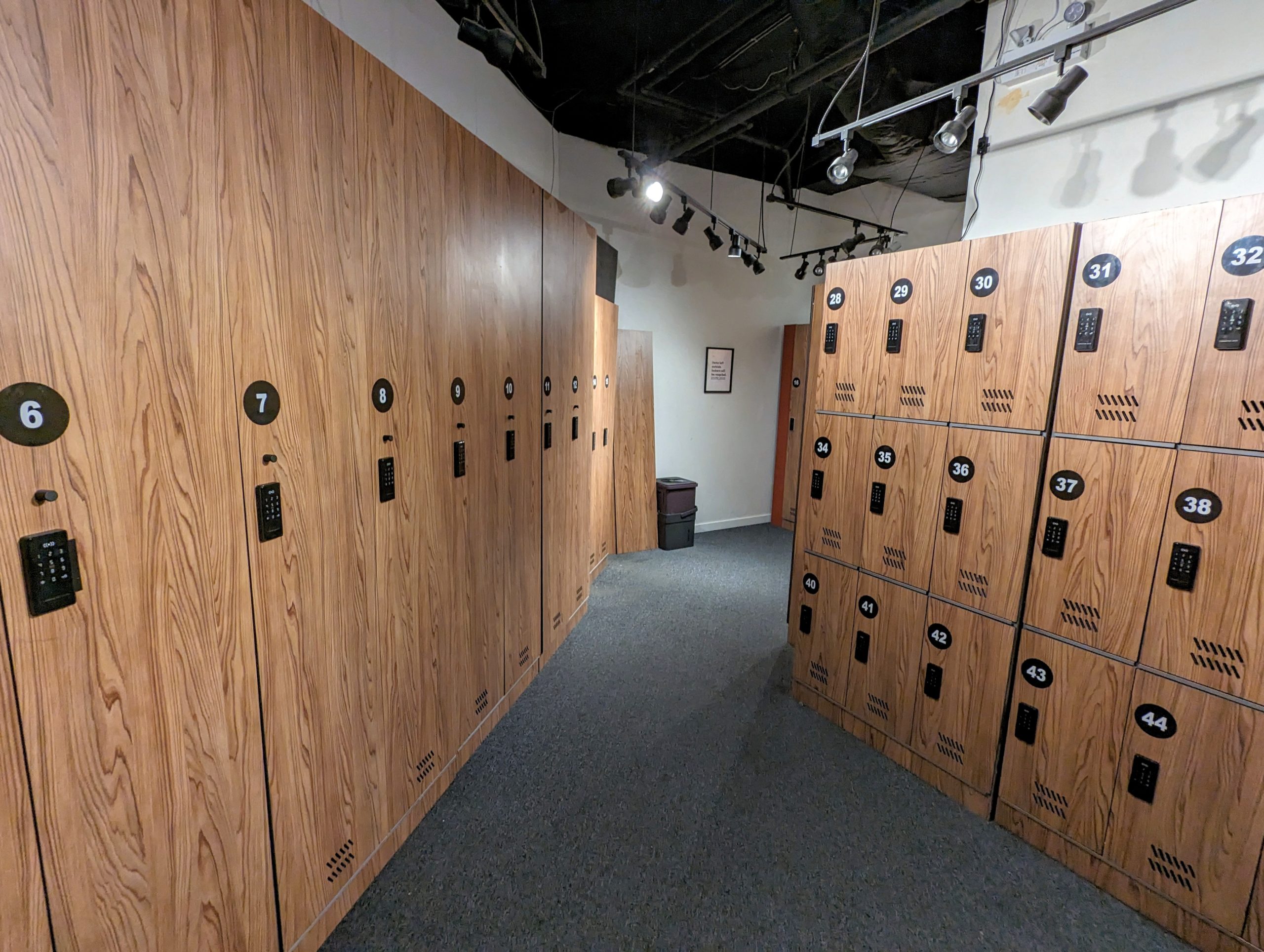 A row of wooden lockers, perfect for storing luggage or ski equipment, in a cozy Whistler lodge.