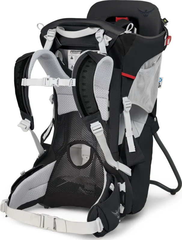 The Loaded Locker - Osprey Baby Hiking Carrier in black and grey is designed for child carrying, featuring padded straps, a mesh back panel for ventilation, multiple adjustment straps, and a sturdy frame stand.